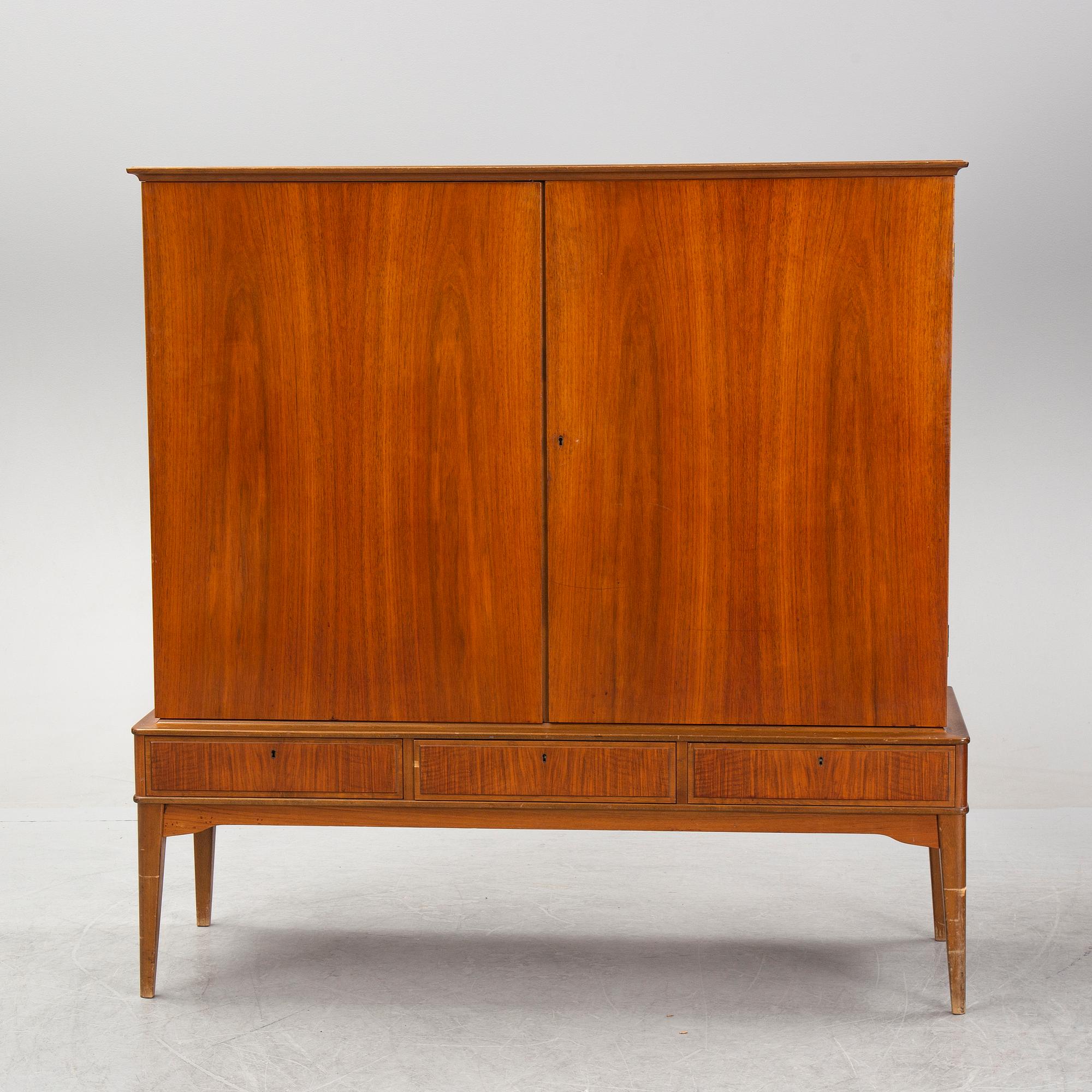 A walnut veneered cabinet, 1940's/50's.
