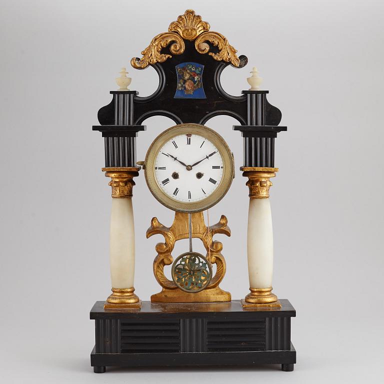 A late Empire table clock, mid 19th Century.