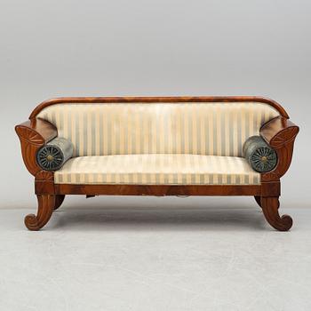 A late Empire sofa, first half of the 19th century.