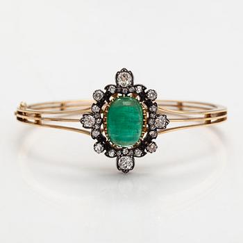 A Bracelet/Pendant made of 14K gold with an emerald and old-cut diamonds ca. 1.95 ct in total.