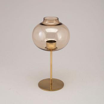 A brass and glass Hans-Agne Jakobsson  candlestick, 1960s / 70s.