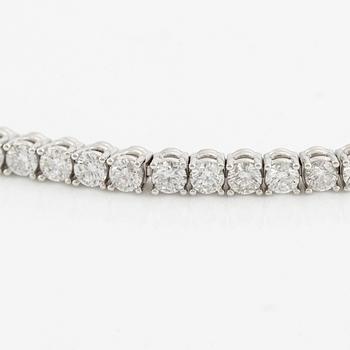 Tennis bracelet, 18K white gold with brilliant-cut diamonds.