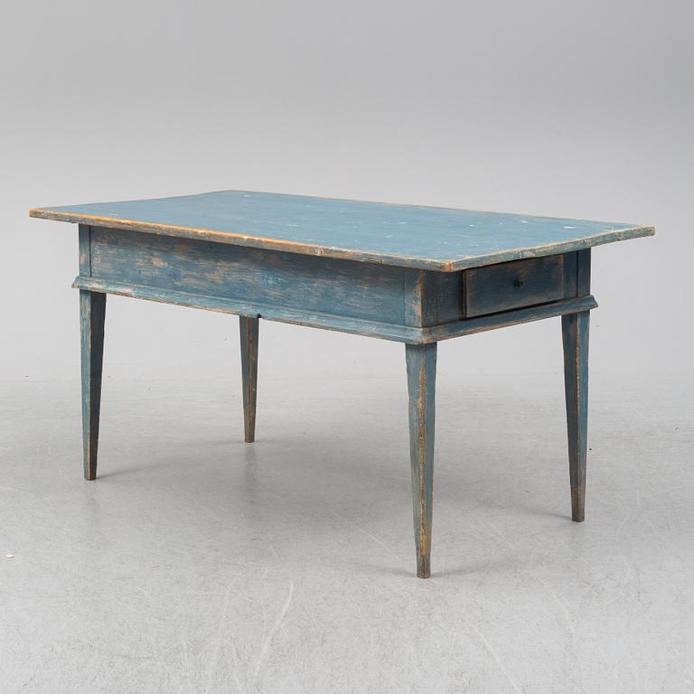 A painted pine table, 19th Century.
