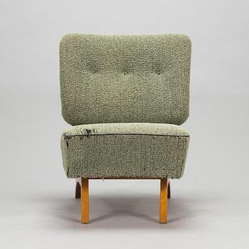 Oiva Parviainen, a mid-20th century 'Susanna' armchair for  Lahden Lepokalusto, Finland.