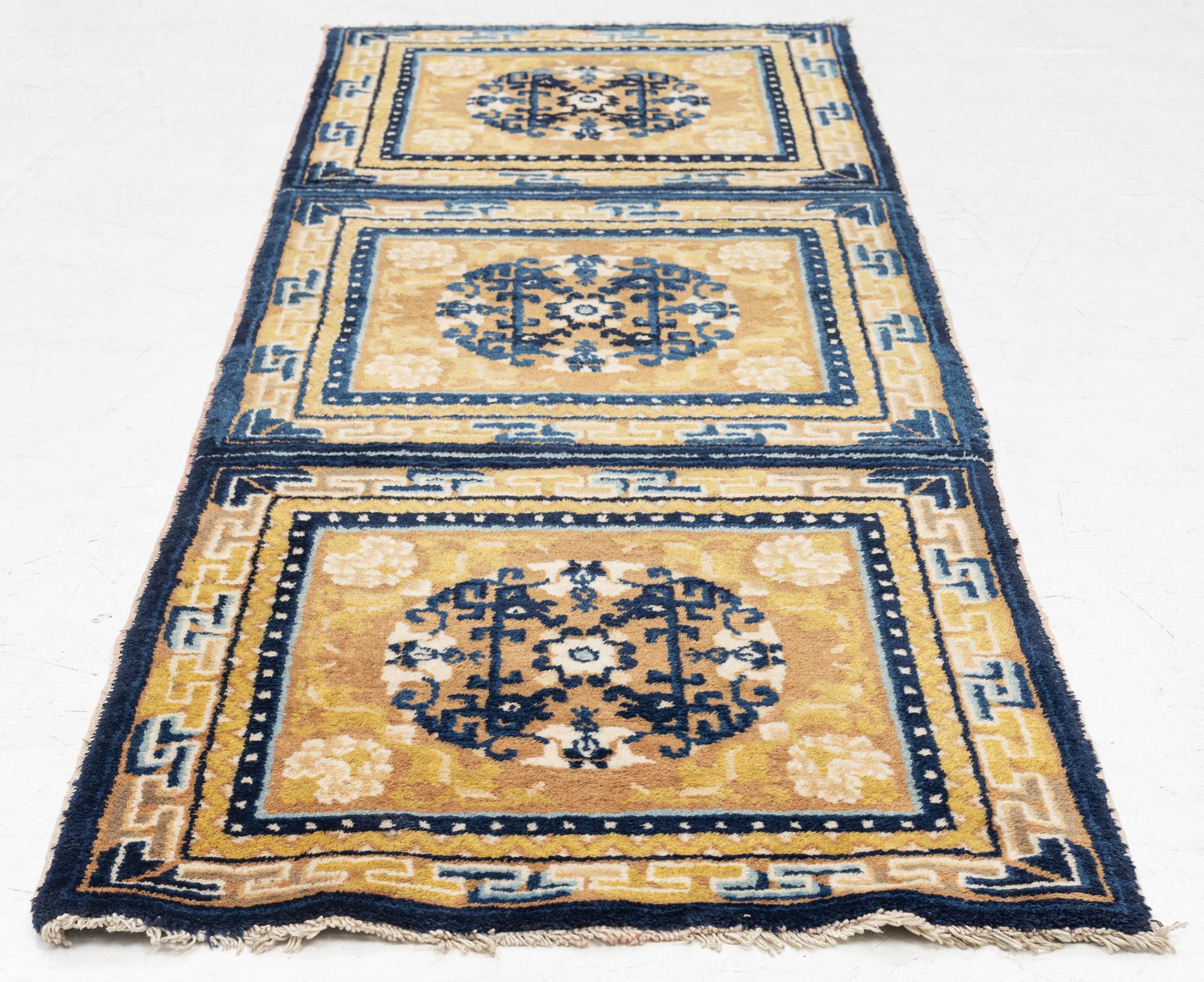 An antique Ningxia meditation rug, north west China, c 189 x 63 cm.