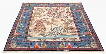 A signed Kashan 'Dabir' carpet, ca 206 x 136 cm.