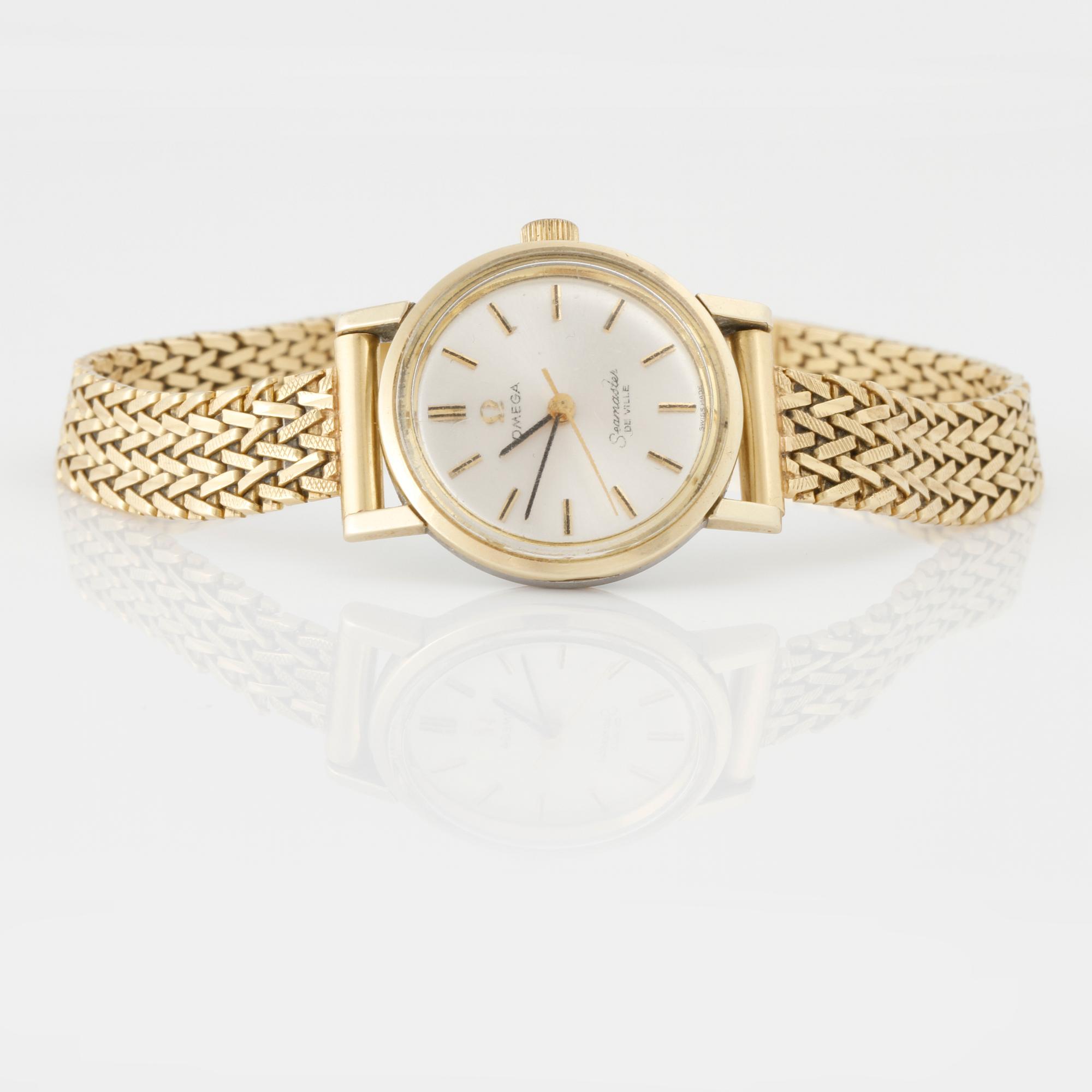 ARMBANDSUR, dam, armband i 18 K guld, Omega, Seamaster De Ville. Total vikt 29 g.