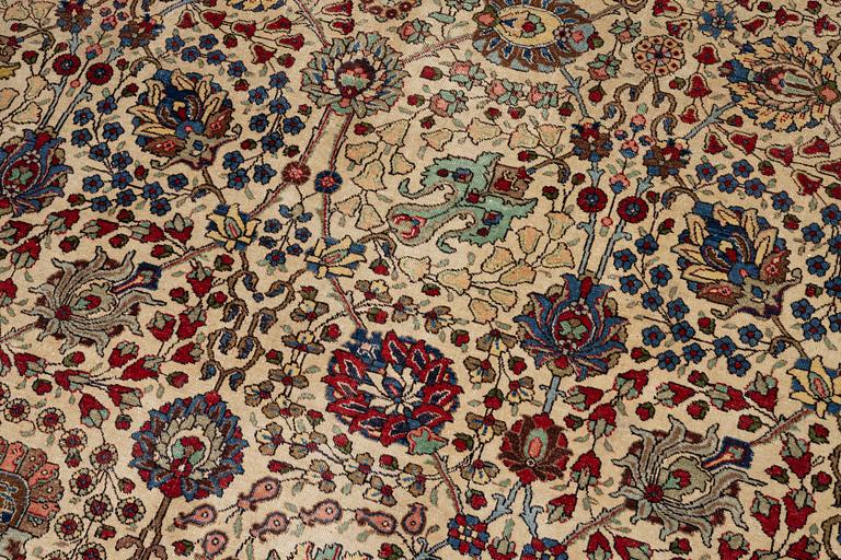 A Tabriz carpet, c. 385 x 287 cm.