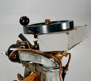 An early 20th century rowboat motor 
by Evinrude Detachable Rowboat Motor Company,
Milwaukee in Wisconsin.