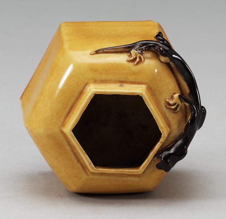 A yellow and brown glazed brush washer with curling dragon, Qing dynasty, 19th Century, with Xuande four character mark.