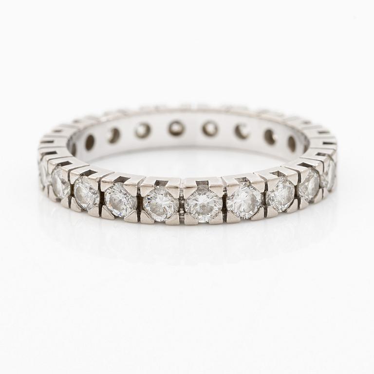 Ring, full eternity band in platinum set with round brilliant-cut diamonds.