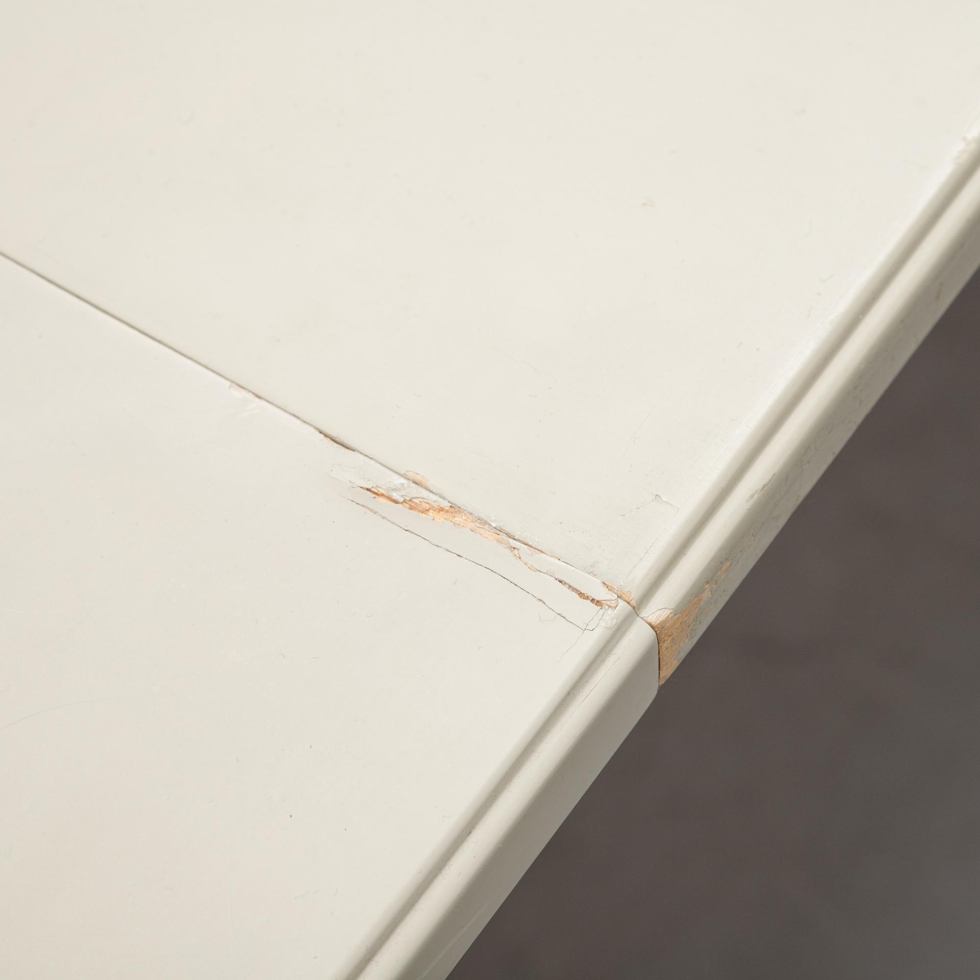 A dining table and six chairs by Carl Malmsten for Bodafors.