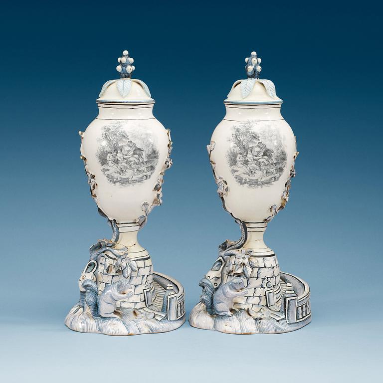 A pair of Swedish Marieberg faience vases with covers, 18th Century.