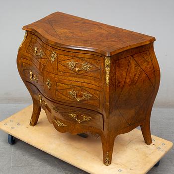 A mid 20th century rococo style chest of three drawers.