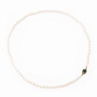 Cultured pearl necklace with Niels Erik From clasp, Denmark, silver set with a green cabochon-cut stone.