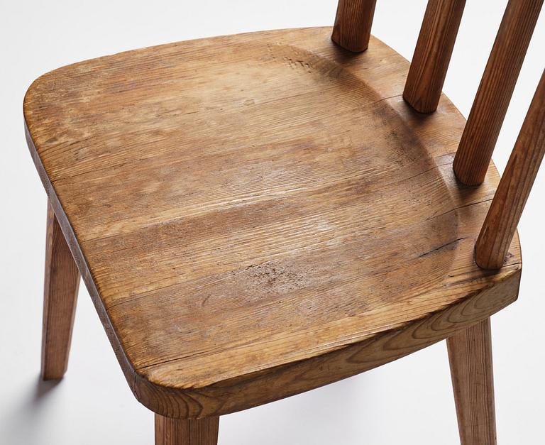 Axel Einar Hjorth, a set of seven stained pine "Utö" chairs, Nordiska Kompaniet, Sweden, 1930s.