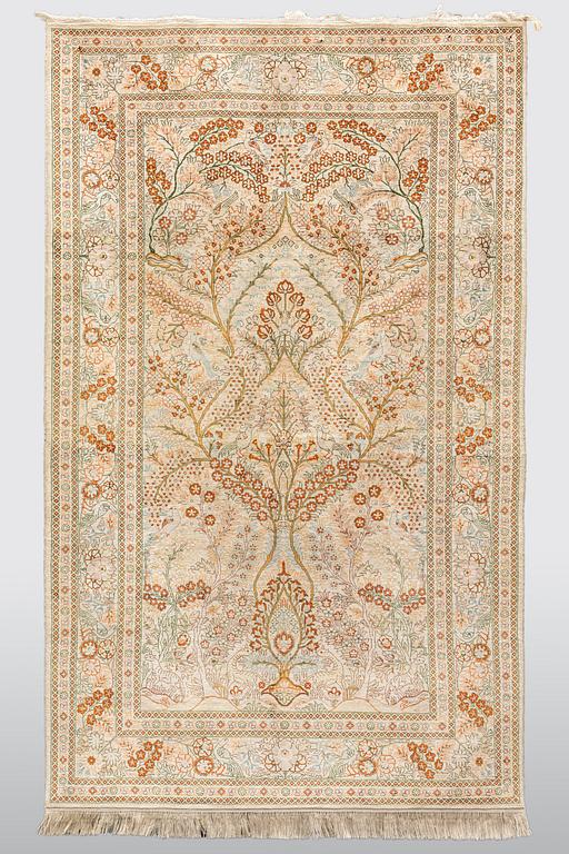 A rug, Oriental silk, ca 154 x 92 cm.