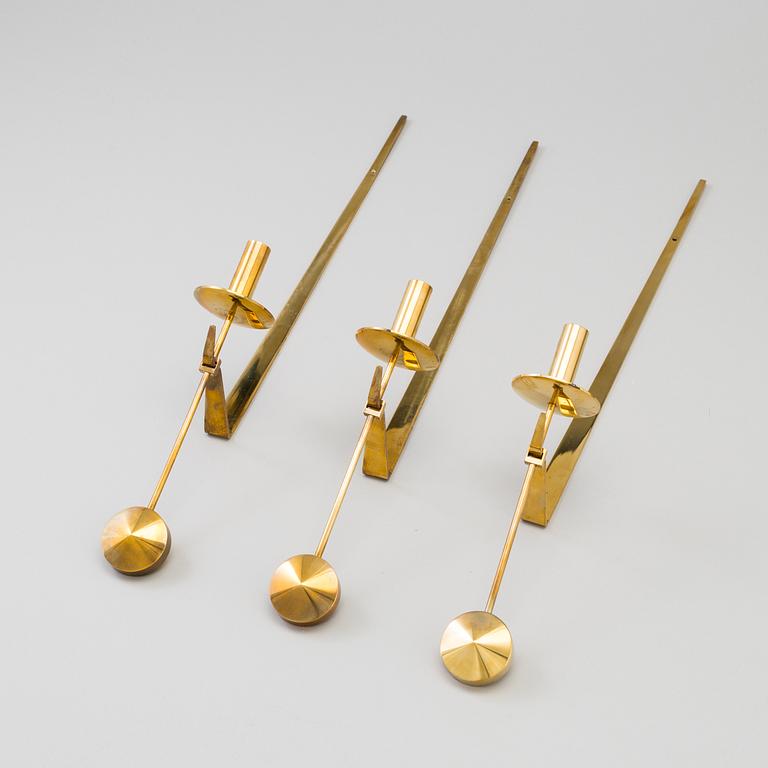 PIERRE FORSSELL, three 'Pendel' brass wall sconces from Skultuna, 1986-91.