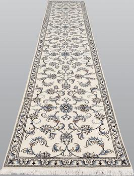 A Nain runner, part silk, c. 394 x 75 cm.
