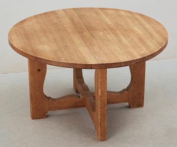 A stained pine dining table, attributed to Axel Einar Hjorth, Nordiska Kompaniet, 1930's.
