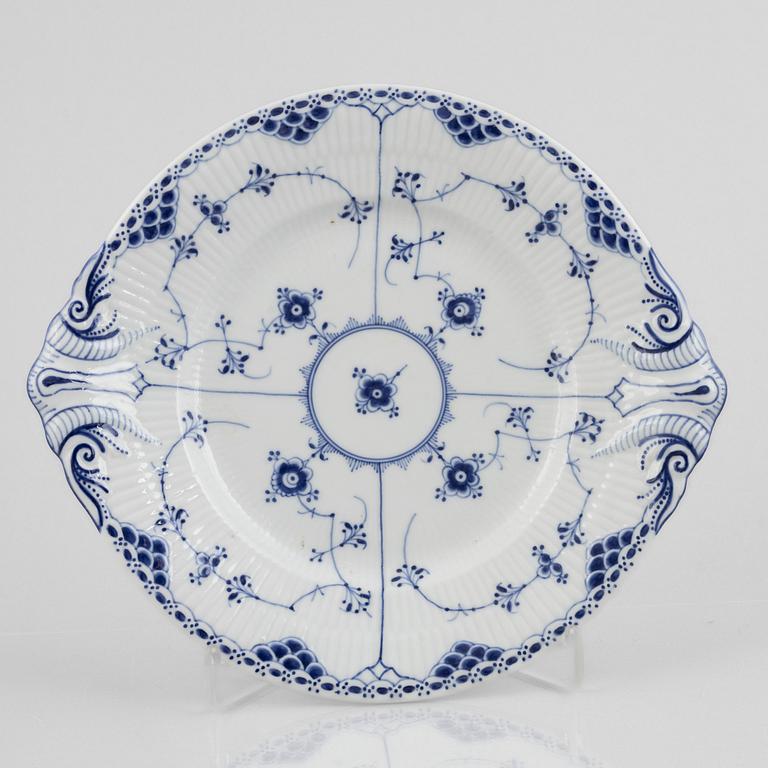 Four porcelain pieces of half lace "Musselmalet", Royal Copenhagen, Denmark, 1894-1945.