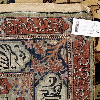 A RUG, a semi-antique/antique Kashan figural, "Motachem", ca 217 x 135 cm (as well as one end with 2,5 cm flat weave).