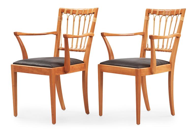 A pair of Josef Frank mahogany and rattan chairs, Svenskt Tenn, model 1165.