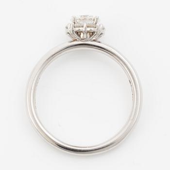 Ring 18K white gold set with a brilliant-cut diamond, accompanied by an IGI report.