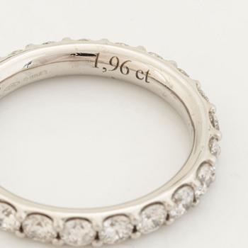 Brilliant cut diamond eternity ring.