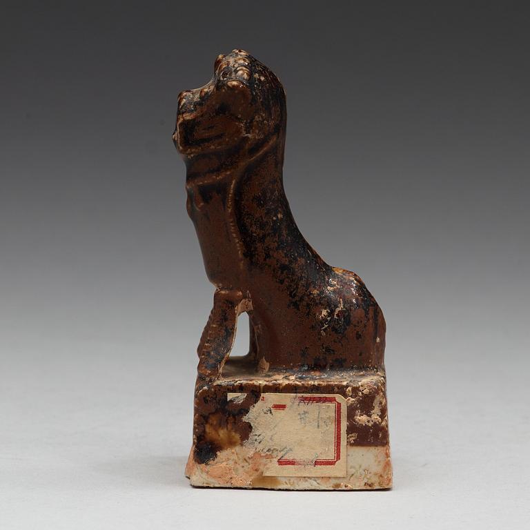 A Brown glazed joss stick holder, Ming dynasty (1368-1643).