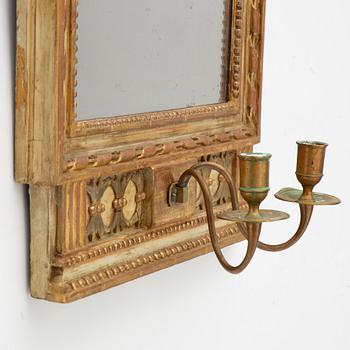 A late Gustavian two-branch girandole mirror, Stockholm, late 18th century.