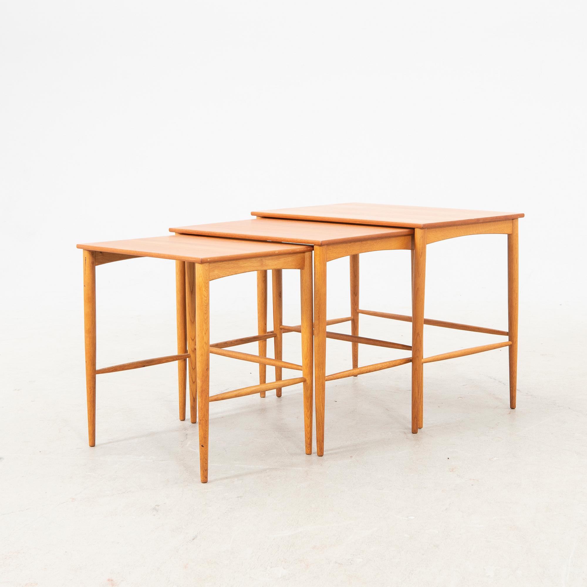 A set of three teak and oak Bertil Fridhagen nesting tables from Bodafor.