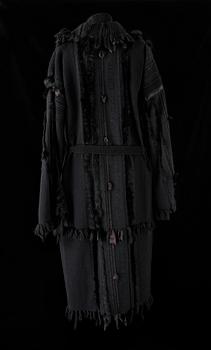 A black coat by Gucci.