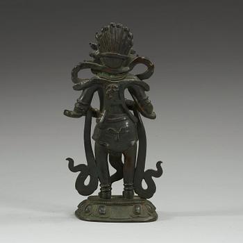 A bronze figure of Mahakala.