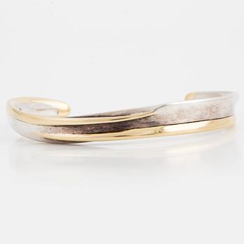 A Georg Jensen silver bangle.