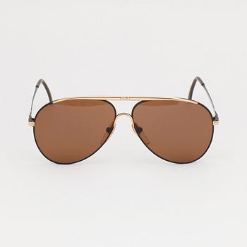 VALENTINO, a pair of sunglasses.