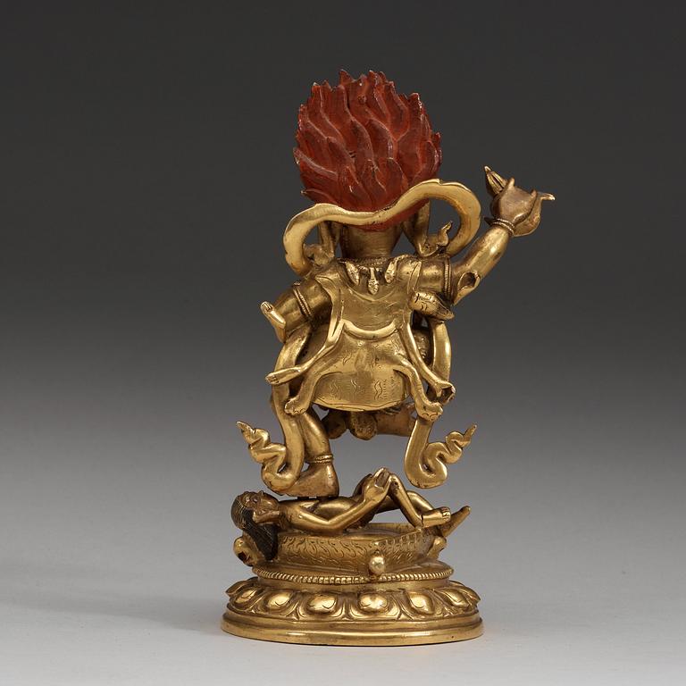 A Sinotibetan lacquered and gilt bronze figure of Takini Sinihavaktra, Qing dynasty, 19th Century or older.