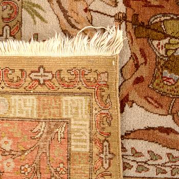 A semiantique Tabriz carpet signed ca 290 x 198 cm.