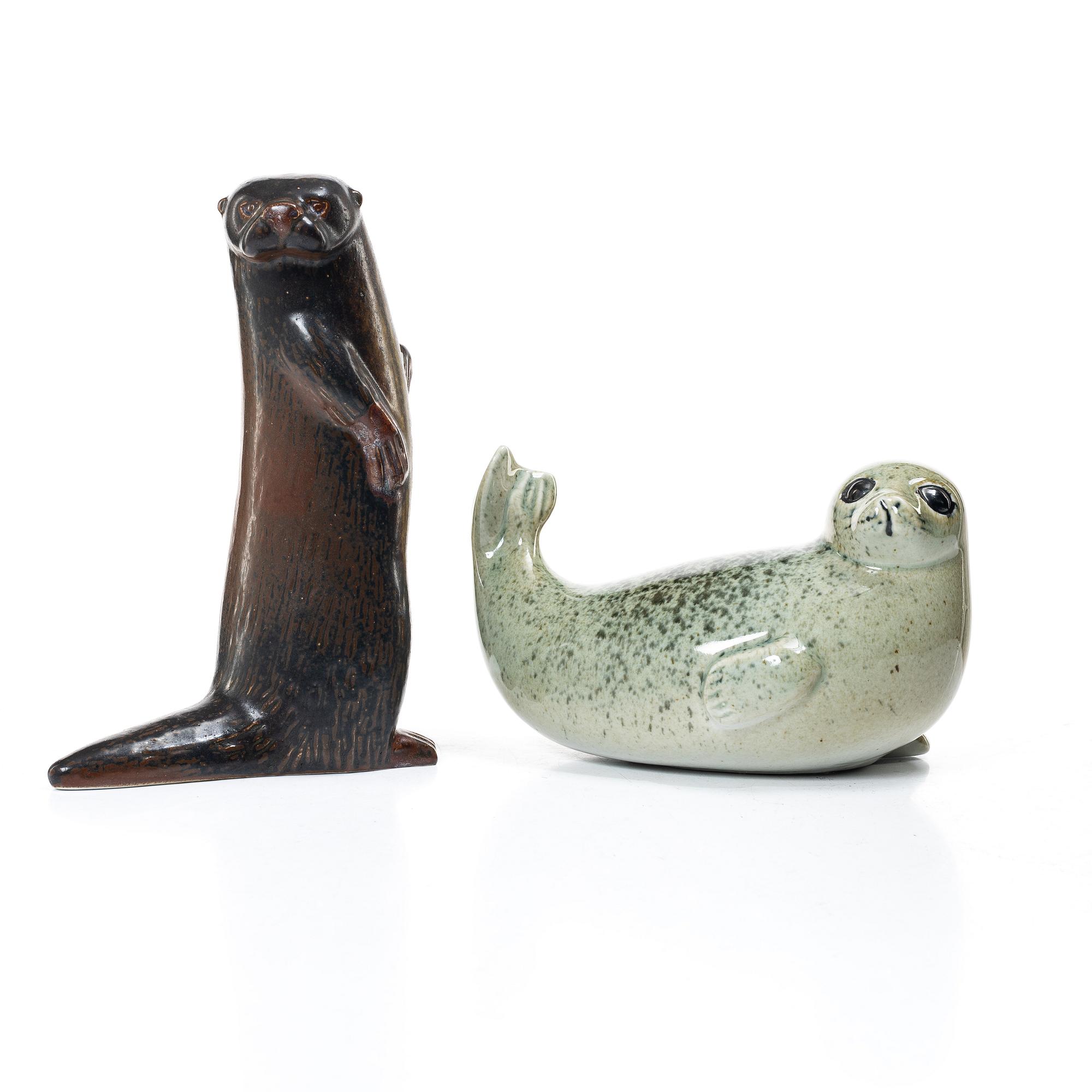 Lisa Larson, a 'Pilgrimsfalk' and 'Bison' figurine, Gustavsberg for NK, Nordiska Kompaniet in collaboration with WWF.