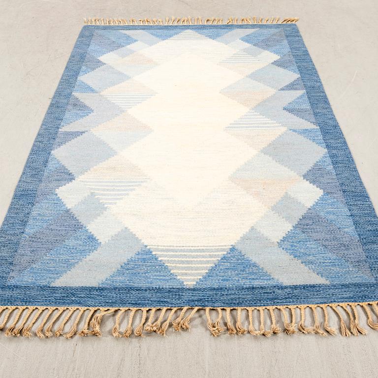 Anna-Johanna Ångtröm, a flat weave carpet labeled 234x163 cm.