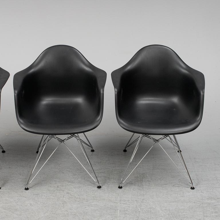 CHARLES AND RAY EAMES,  4  Eames Plastic Armchair, Vitra 2010.