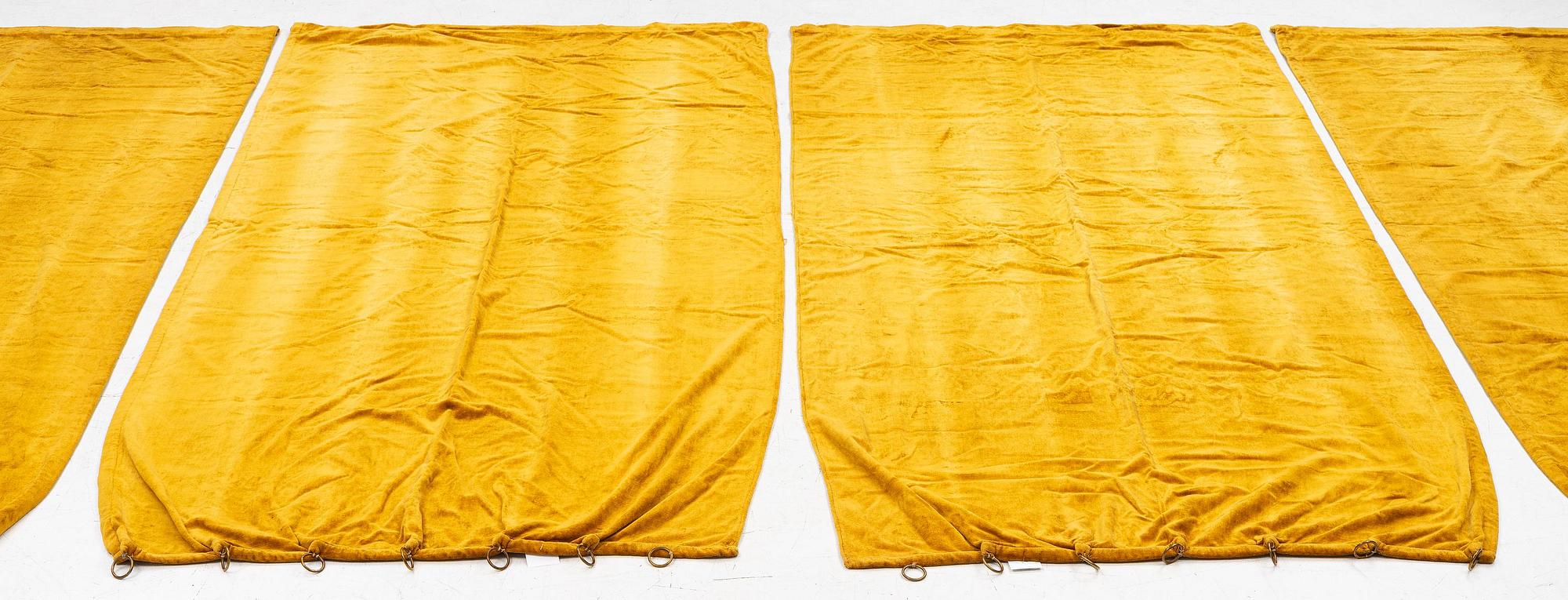 A set of four yellow velvet curtains, 1910's/20's, ca 247 x 120 cm.