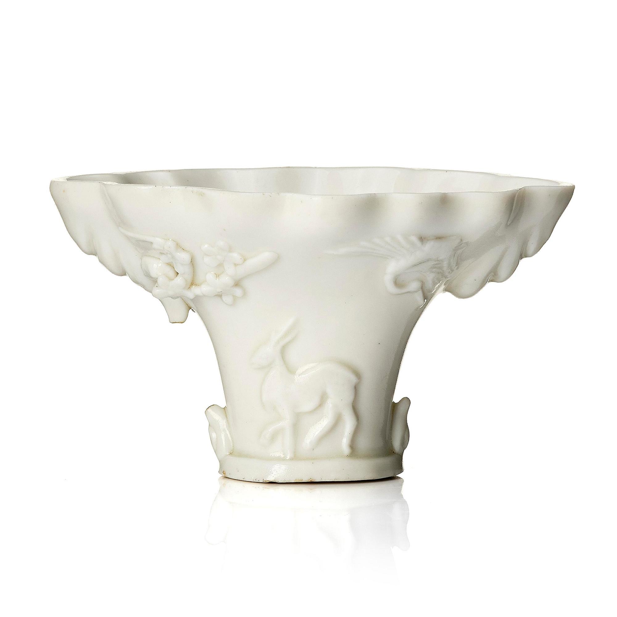 A blanc de chine libation cup, Qing dynasty, 18th century.