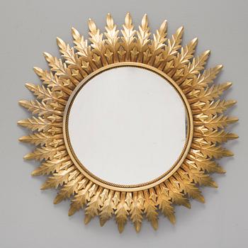 A mid 20th century sun-shaped mirror.
