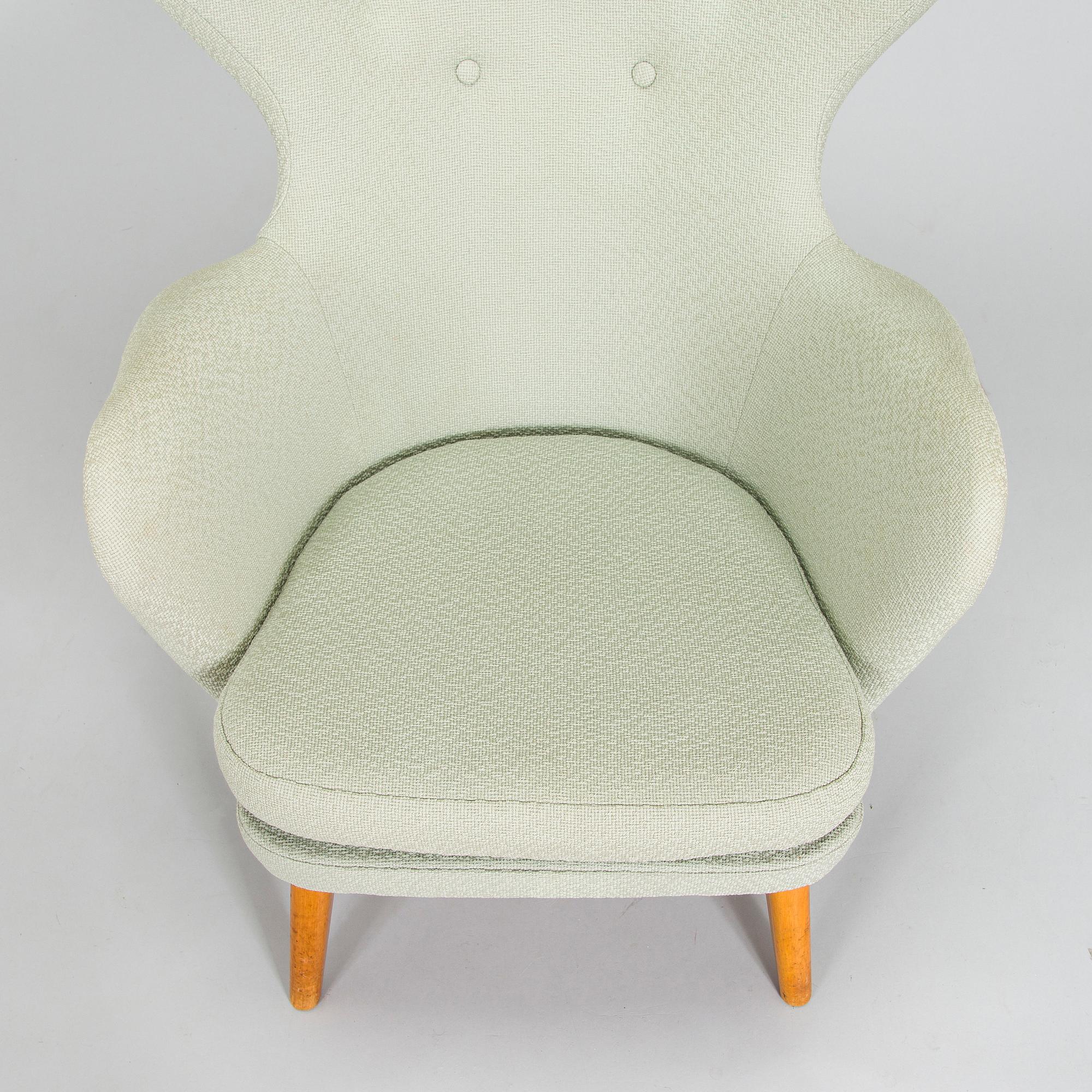 Carl Gustaf Hiort af Ornäs, A mid-20th-century armchair 'Siesta' manufacturer Puunveisto Oy - Träsnideri Ab, Finland.