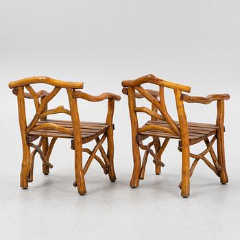 A pair of chairs, mid 20th Century.