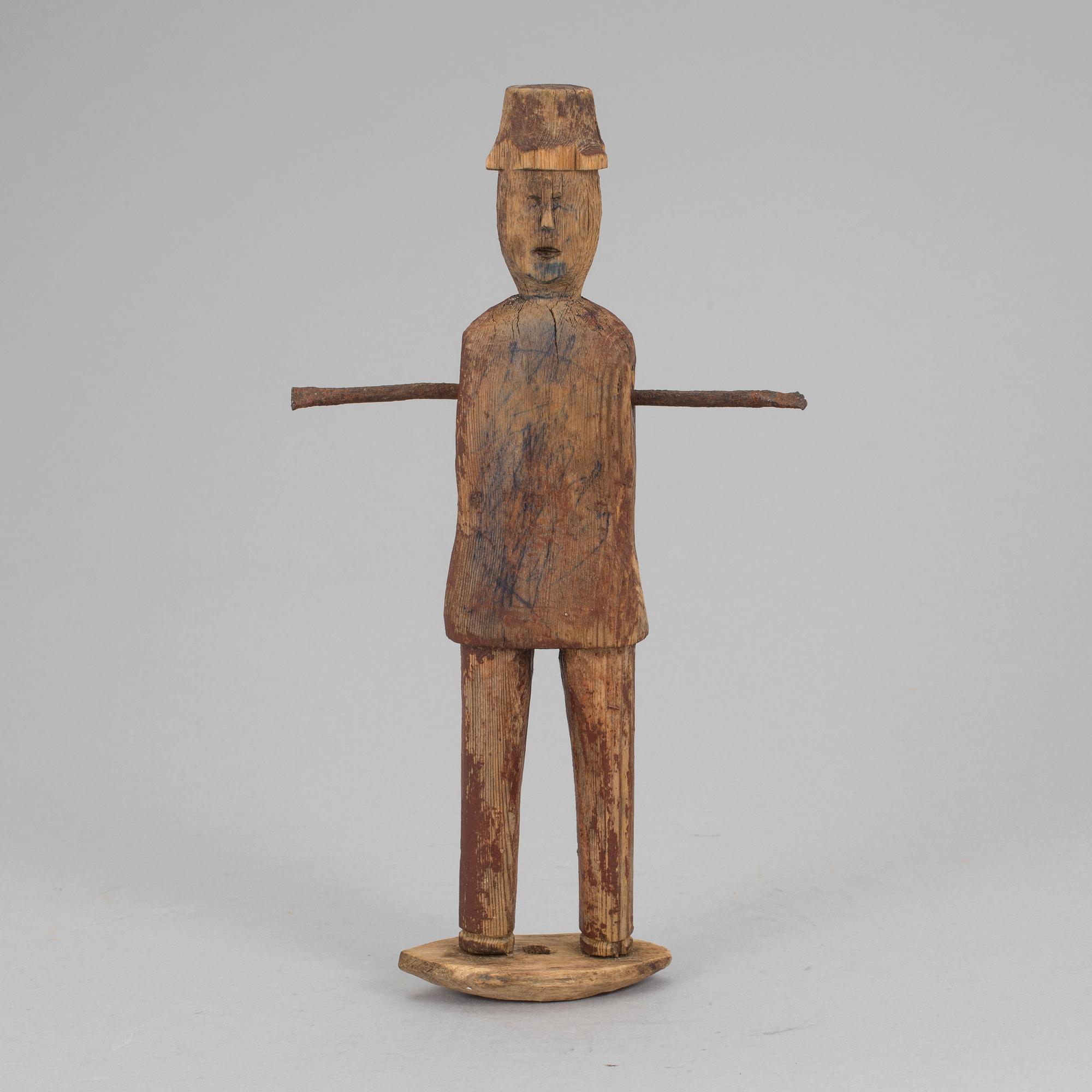 A wooden tool/sculpture, ca 1850.