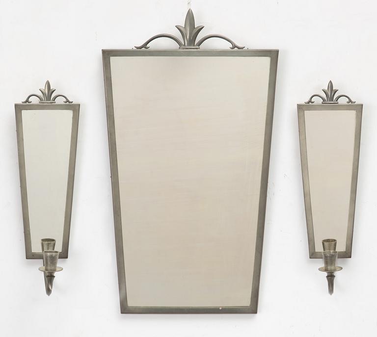 A mirror and pair of wall sconces, Sweden, 1932.