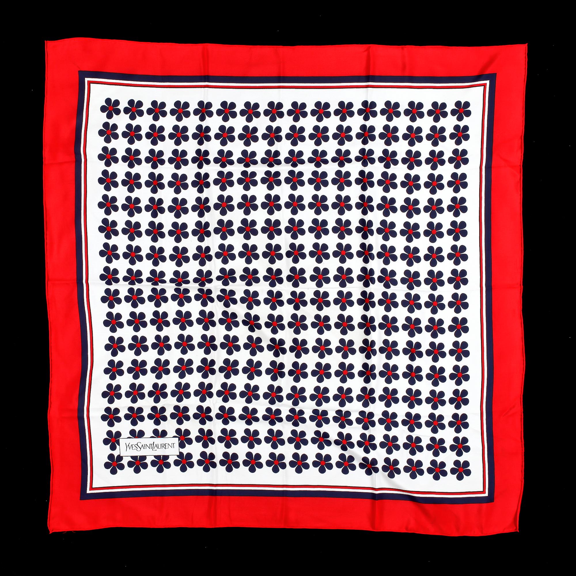 A set of three scarves by Christian Dior, Emilio Pucci and Yves Saint Laurent.