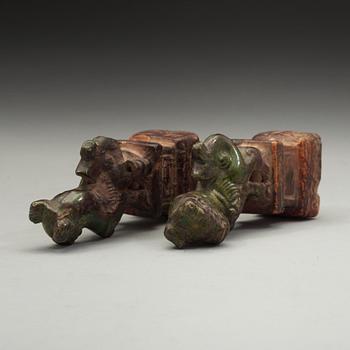 A pair of green and yellow glazed joss stick holders, Ming dynasty (1368-1644).